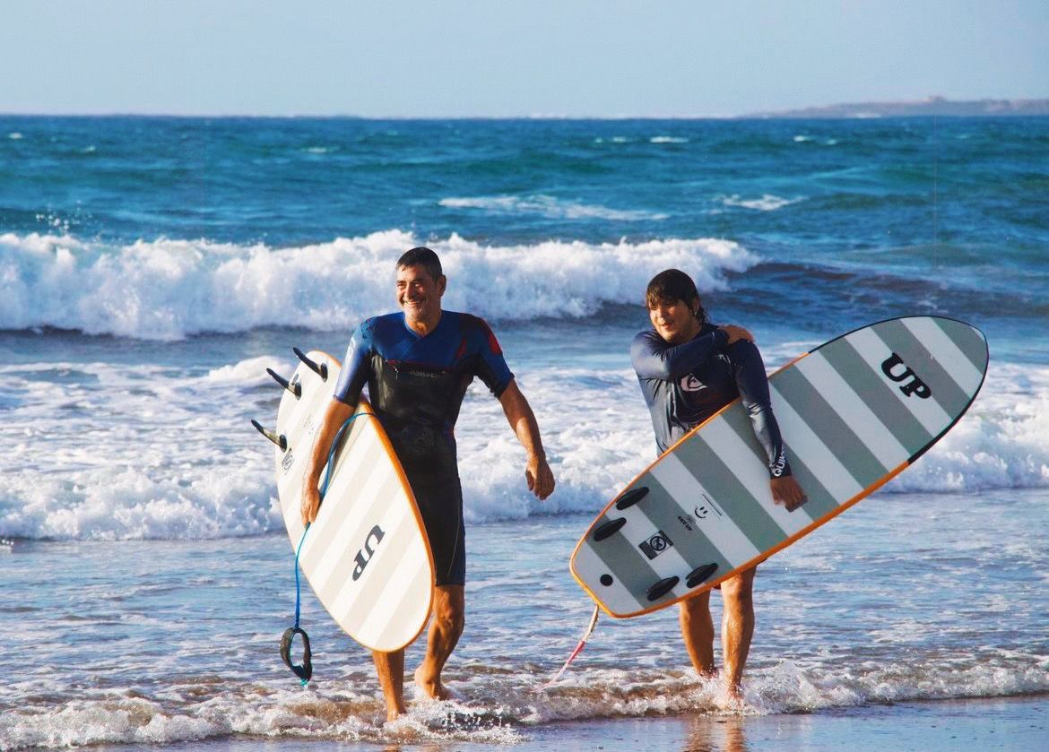 Surfing at sunrise